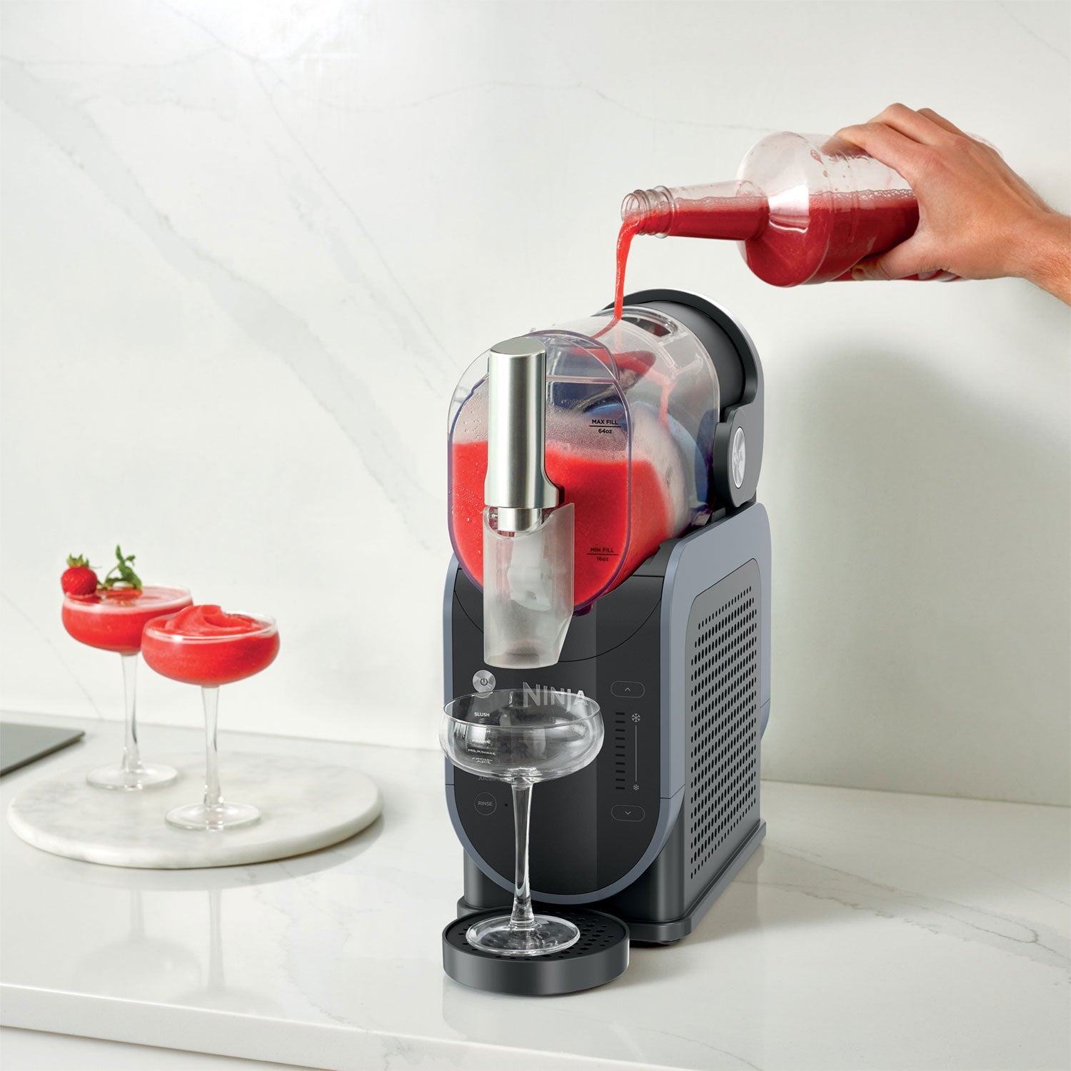 Liquid being poured into Ninja SLUSHi