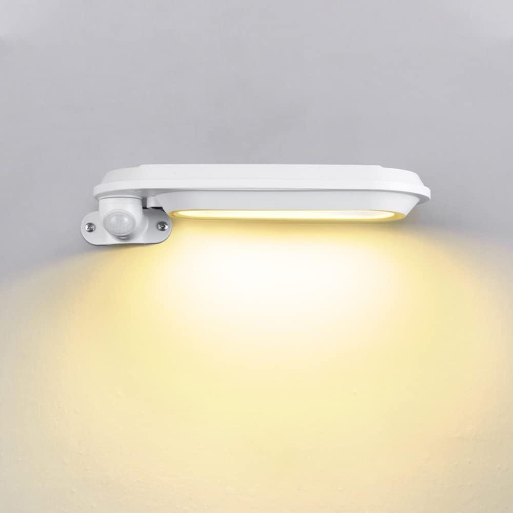 Lampara solar para exteriores. Luz LED cálida amarilla. Panel solar integrado con sensor de movimiento hasta 10 mts de distancia