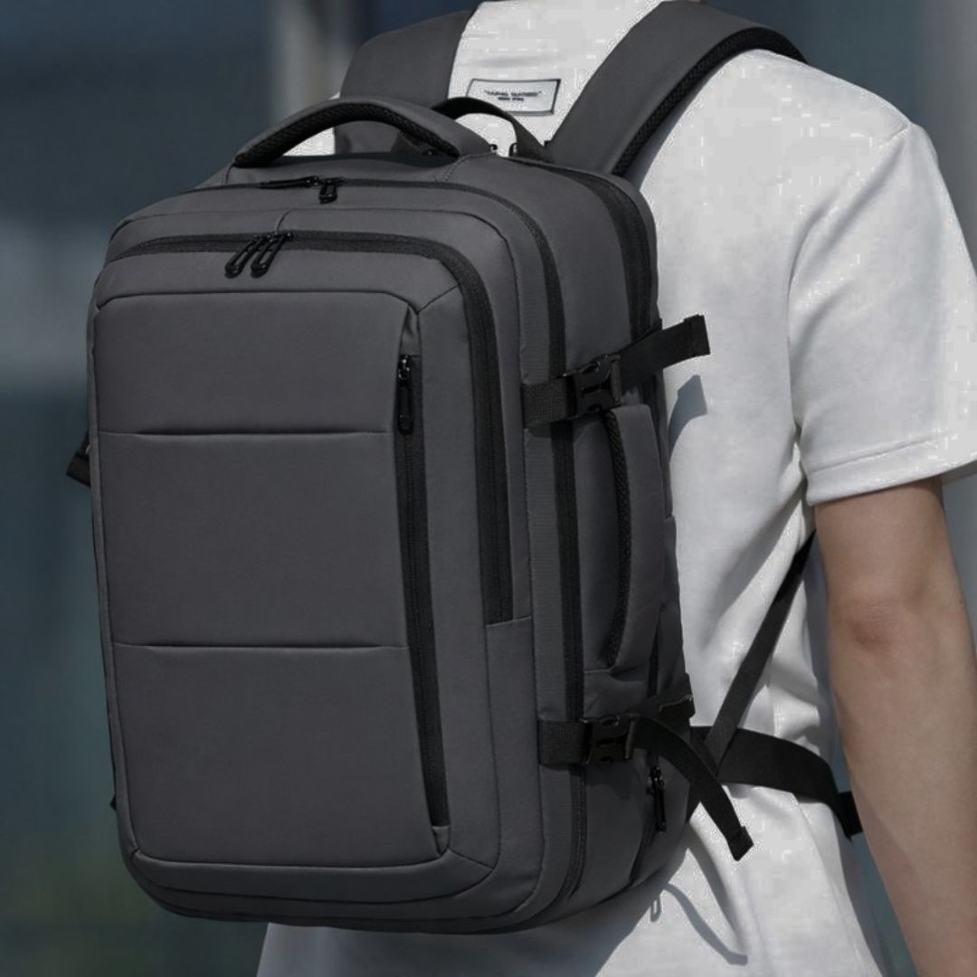 Mochila de Viaje Impermeable Antirrobo para Laptop 15.6”. Backpack Morral con Compartimentos Organizados y de Gran Capacidad. Color Gris.