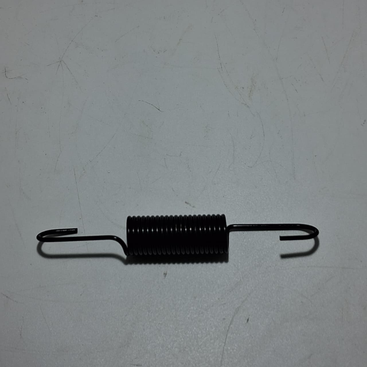 Resorte de pedal de freno trasero (TX200)