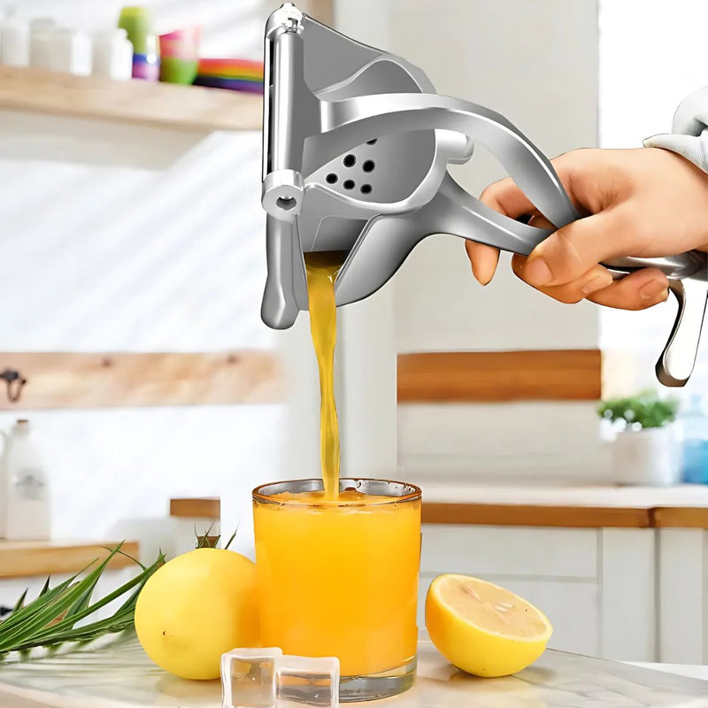 Exprimidor de jugo manual para cocina. Herramienta extractora de zumo. Naranjas y limones