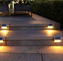 Luces LED con panel solar para exteriores. Luz cálida amarilla 3 LED en acero inoxidable de pared o escalera.