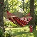 Hamaca de tela multicolor con barras de madera (260x100cm). Ideal para camping y exterior. Incluye accesorios.