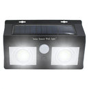 Lampara solar LED para exterior con sensor de movimiento. Foco de pared con panel solar. Luz blanca para jardines o patios.