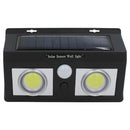 Lampara solar LED para exterior con sensor de movimiento. Foco de pared con panel solar. Luz blanca para jardines o patios.