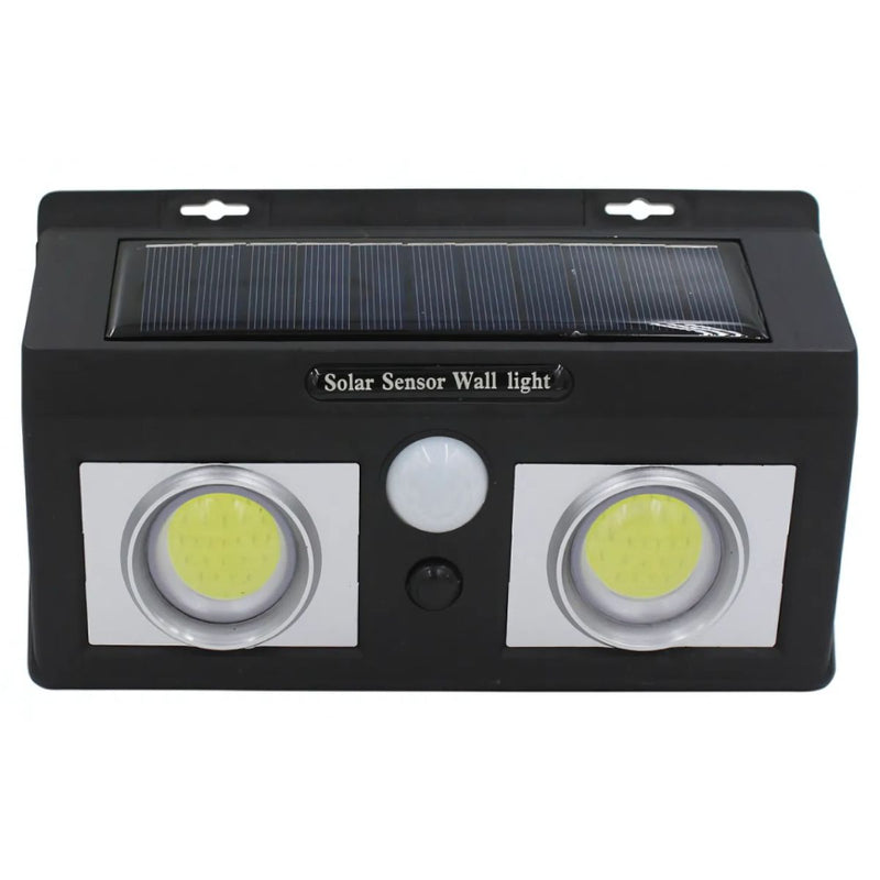 Lampara solar LED para exterior con sensor de movimiento. Foco de pared con panel solar. Luz blanca para jardines o patios.