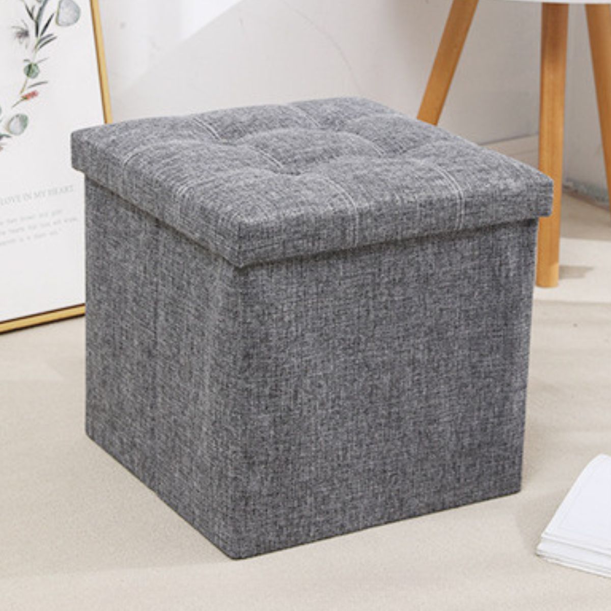 Baúl organizador. Asiento Plegable Tipo Puf Otomano. Caja banco con Espacio de Almacenaje 38x38cm. Color gris.