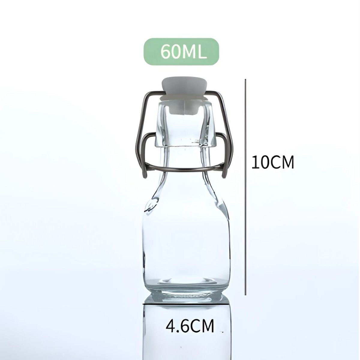 Botella De Vidrio Transparente Con Tapa Hermética Abatible. 60 ml