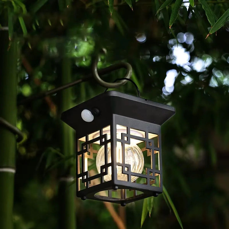 Lámpara Solar Decorativa con Sensor de Movimiento 1200 mAh. Foco LED con Panel Solar. Luz Cálida para Jardín o Pared Exterior.