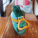 Botella de Agua Deportiva Pastica de 550ml. Termo Celeste con Naranja. BPA Free. 19.5x6.8xm.