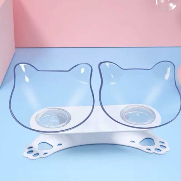 Tazón doble para gatos con soporte. Plástico transparente y soporte blanco.