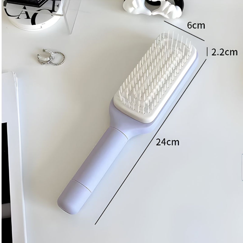 Cepillo para Cabello Con Dientes Retráctiles Autolimpiante. Peine Diseño Ergonómico de 24 cm. Color Lila.