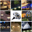 Lampara solar de piso para exterior. Foco con 8 LED. Luz cálida (Set de 4 unidades).