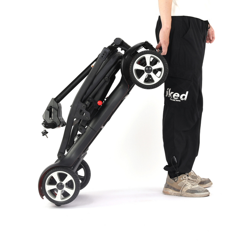 Scooter Discapacitados Silla de ruedas eléctrica de plegado manual 30kg. Bateria litio 12 km