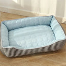 Cama suave de tela para mascotas. Tamaño 70x54x18cm. Peso 12-25kg. Color Azul.