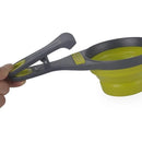 Taza de medir el alimento de tus mascotas. Material  silicona con pinza para cerrar bolsas.