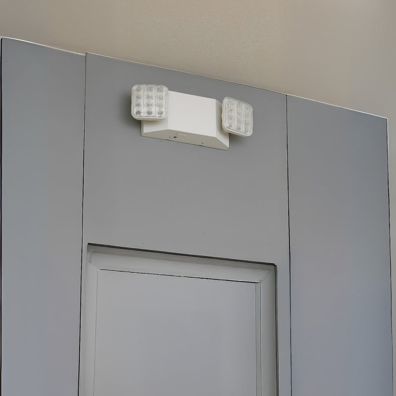 Lampara de Emergencia de 2 Bombillos Giratorios. 100-277V / 50-60Hz. Indicar LED. Material Plastico.