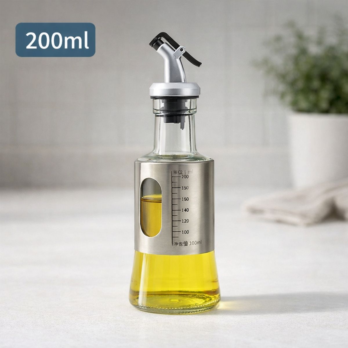 Botella Dosificadora de Aceite 200 ml con Escala Graduada De Vidrio con Funda de Acero Inoxidable Para Cocina Doméstica y Profesional