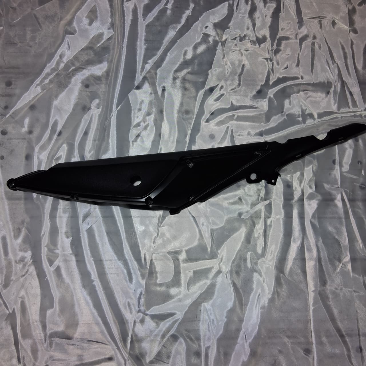 Covertor trasero inferior izquierdo (TNT25)