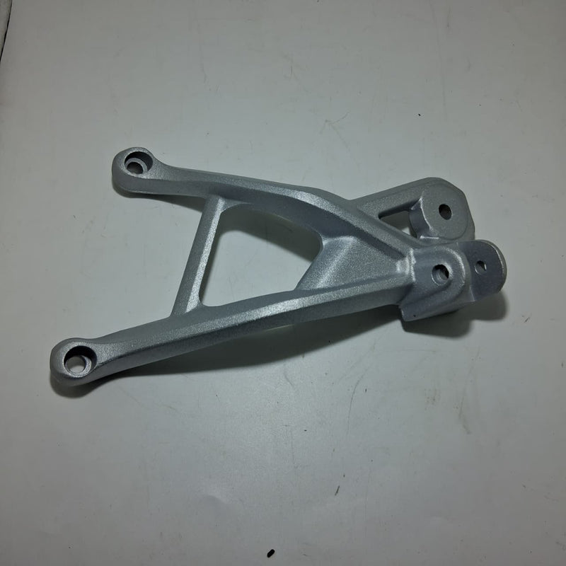 Anclaje de posapie trasero izquierdo (TRK502X)