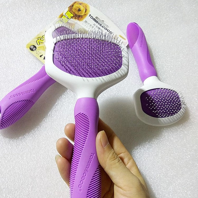 Cepillo con cerdas de acero inóxidable para mascotas.