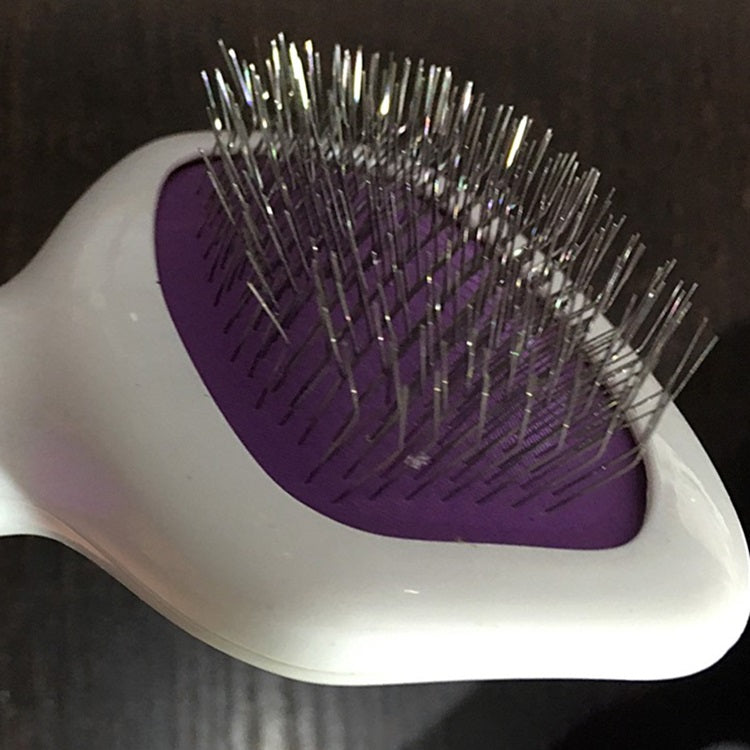 Cepillo con cerdas de acero inóxidable para mascotas.