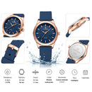 Naviforce Reloj Analógico Azul con Detalles Rose Gold y Correa de Silicona, Diámetro de 36 mm, Cristal Mineral Endurecido y Resistencia al Agua 3 ATM.