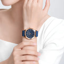 Naviforce Reloj Analógico Azul con Detalles Rose Gold y Correa de Silicona, Diámetro de 36 mm, Cristal Mineral Endurecido y Resistencia al Agua 3 ATM.