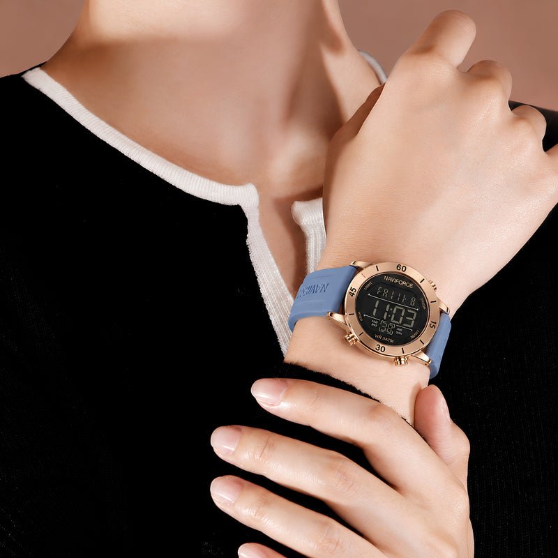 "Naviforce Reloj Digital Azul con Detalles Rose Gold y Correa de Silicona, Diámetro de 36 mm, Cristal Mineral Endurecido y Resistencia al Agua 3 ATM. "