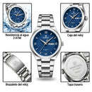 Naviforce Reloj Analógico Plateado con Esfera Azul y Correa de Acero Inoxidable, Diámetro de 38.5 mm, Calendario y Resistencia al Agua 3 ATM.