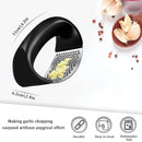 Triturador machacador de ajo. Color negro.