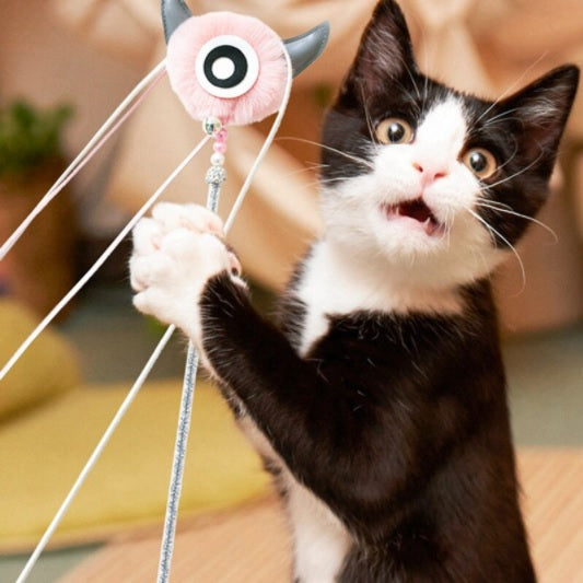 Juguete para gato varita de algodon y cintas. Color Gris. Tamaño 50cm